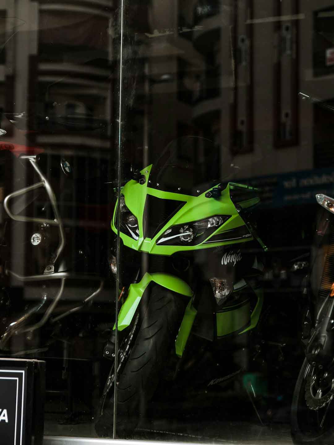 Person choosing a hybrid bike in a store