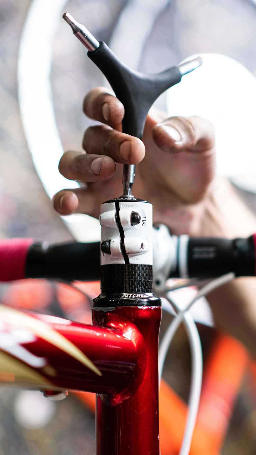 Cyclist adjusting the gears of a road bike
