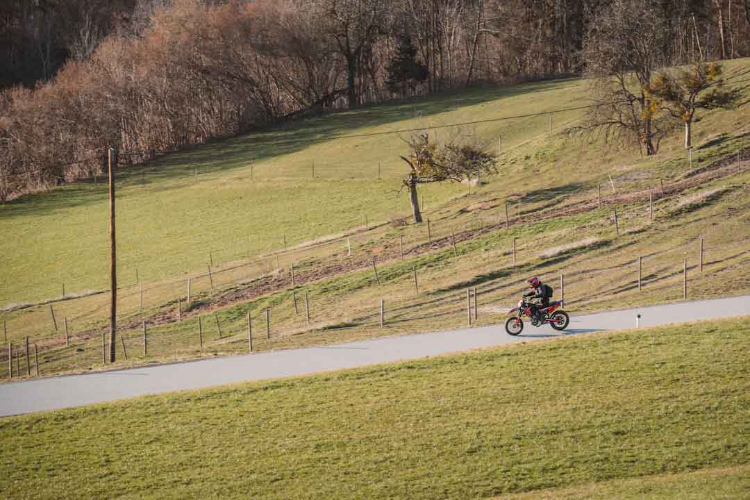Cyclist testing a road bike on a scenic trail