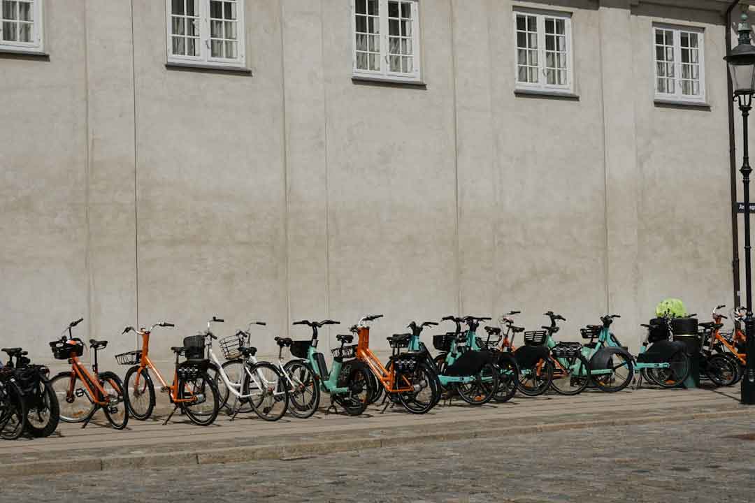 Cyclists riding different types of bikes