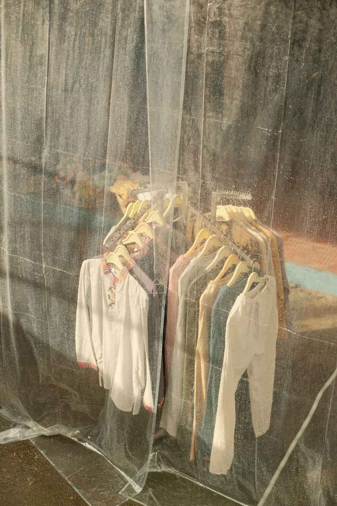 Assorted rain jackets hanging