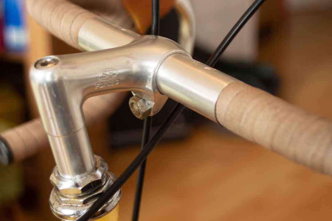 Adjusting bike chain tension