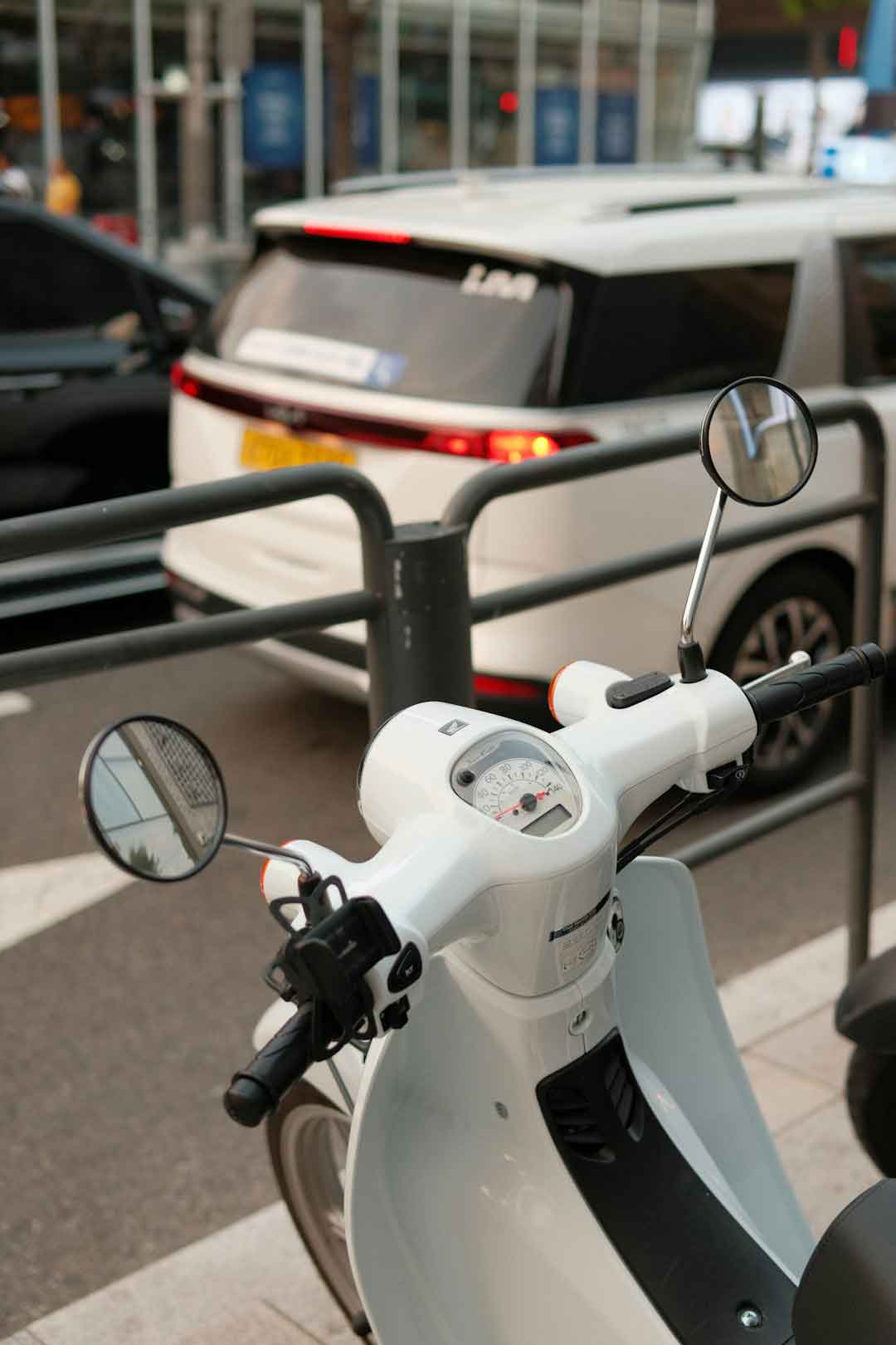 A road bike equipped with front and rear lights for visibility